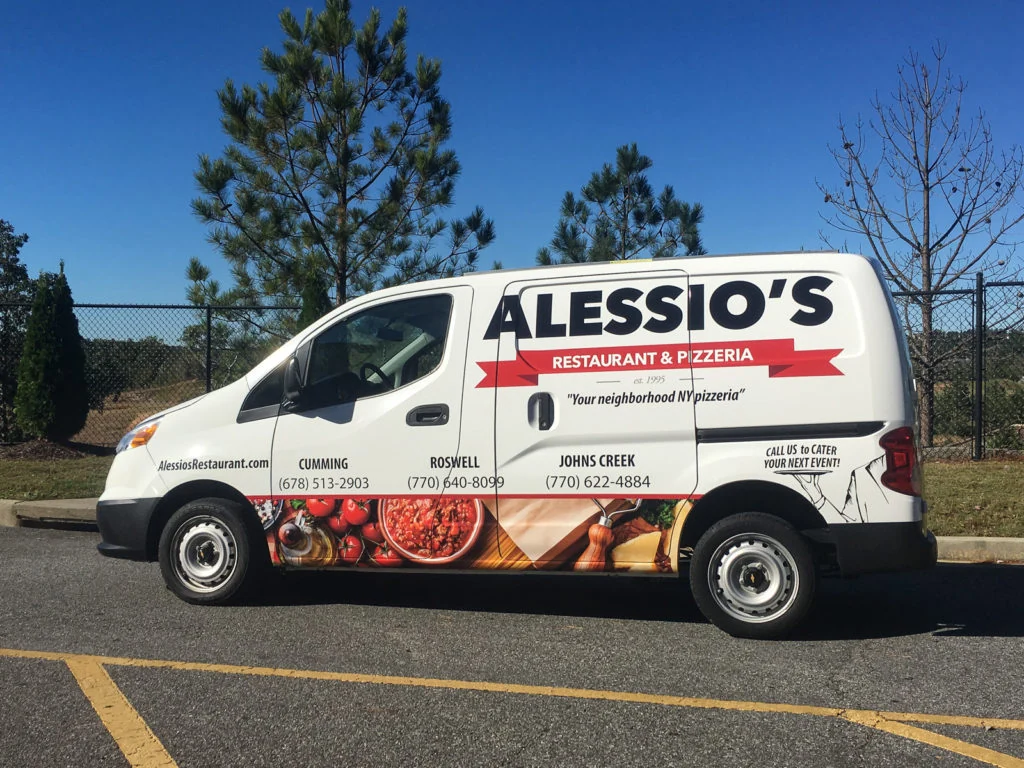 Alessio's Restaurant and Pizzeria van with red lettering and food photography